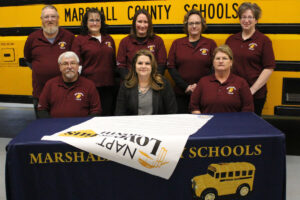 Pictured seated: Dr. Shelby Haines is flanked by MCS Safety Team members Douglas Brown and Dee Gamble. Back row from left are MCS Safety Team members: Kenny Richmond, Paula Carmichael, Kayla Kidd, Nadine McCardle and Ashley Becker.